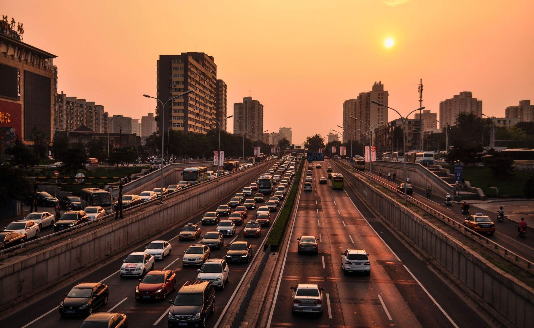 A driver on the road at dusk — the corridor work of cross-border transport